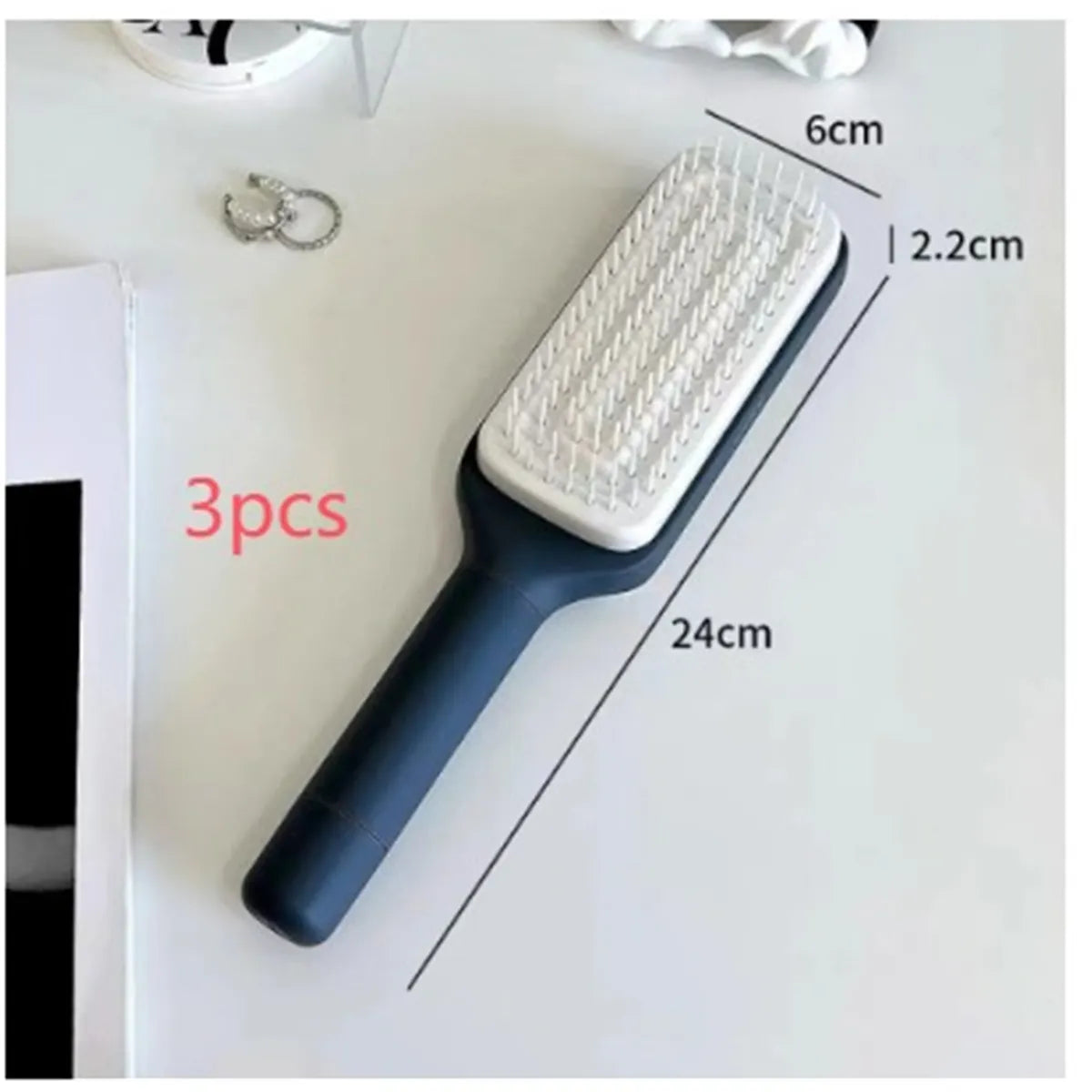 4-in-1 Self-Cleaning Hairbrush