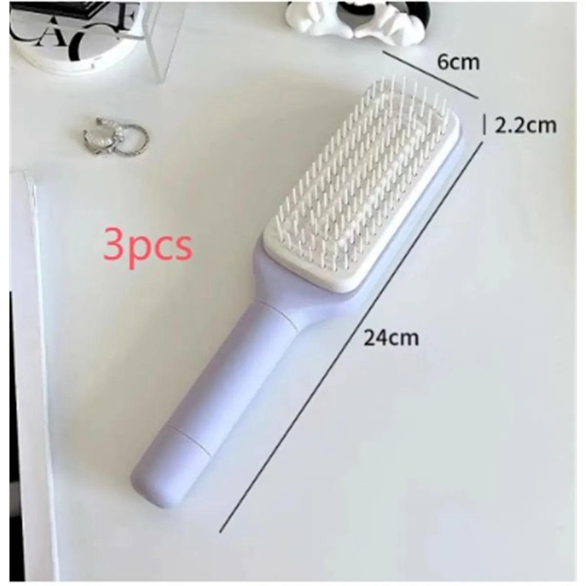 4-in-1 Self-Cleaning Hairbrush