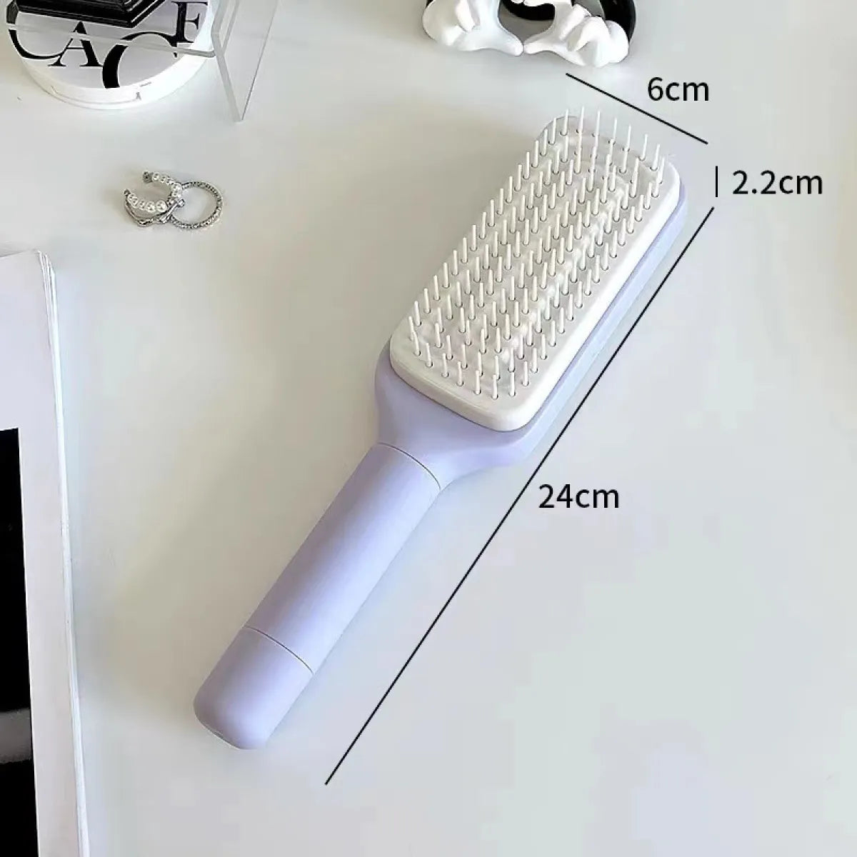 4-in-1 Self-Cleaning Hairbrush